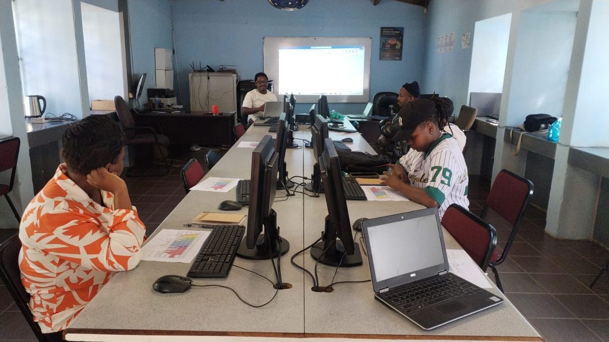 The Katlehong Computer School computer lab with learners at desktop computers.